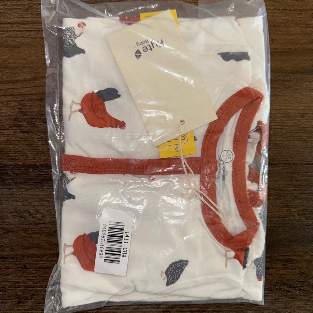 Kyte BABY Chick button up romper